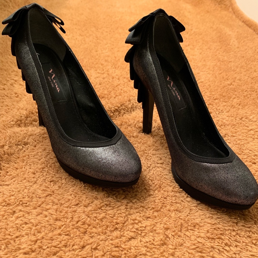 Silver and black heels
